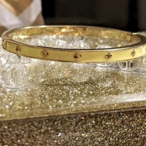 Kate Spade yellow and gold 'Spot the Spade' hinge bangle bracelet